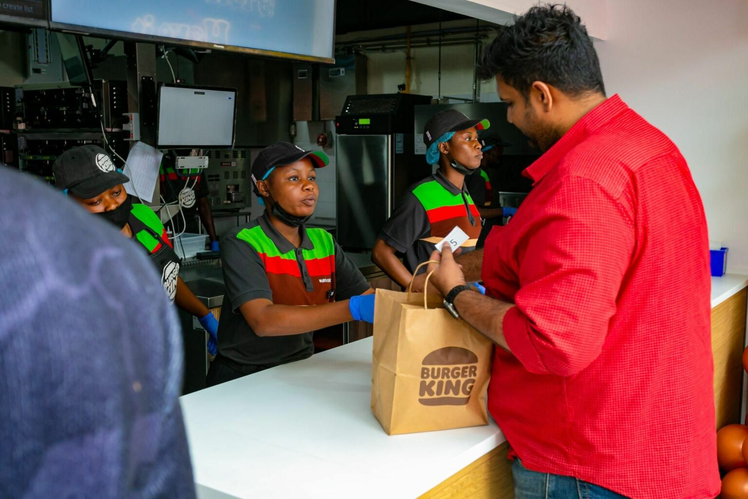 Free gifts are offered to customers as Burger King Surulere opens